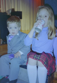 Andy as pageboy at the wedding fayre taking a break with friend Zoe